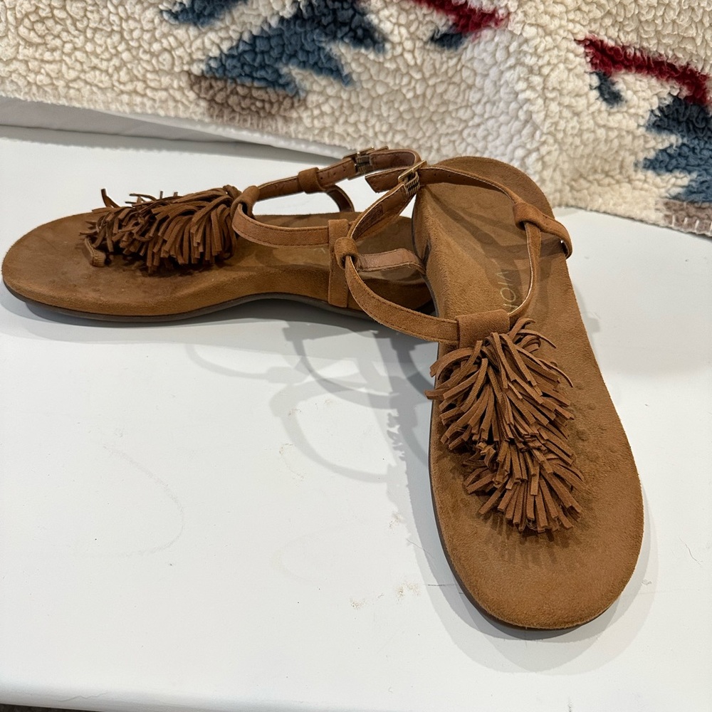Brown fringe sandals